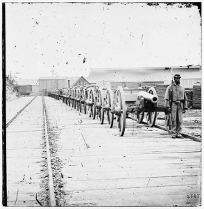 City Point, Virginia. Negro soldier guarding 12-pdr. Napoleon. (Model 1857?). Library of Congress.